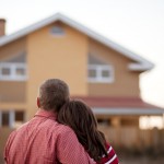 couple outside house