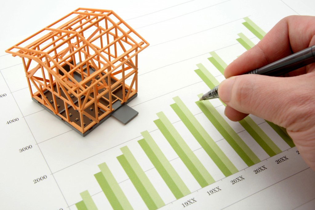 House-model-hand-pen-graphs-mortgage-rates-interest-1024x683.jpg