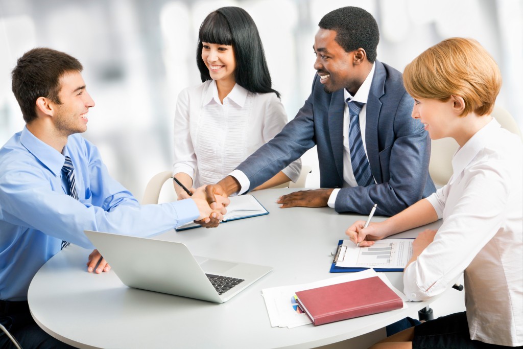 business-people-meeting-sitting-around-a-table-1024x683.jpg