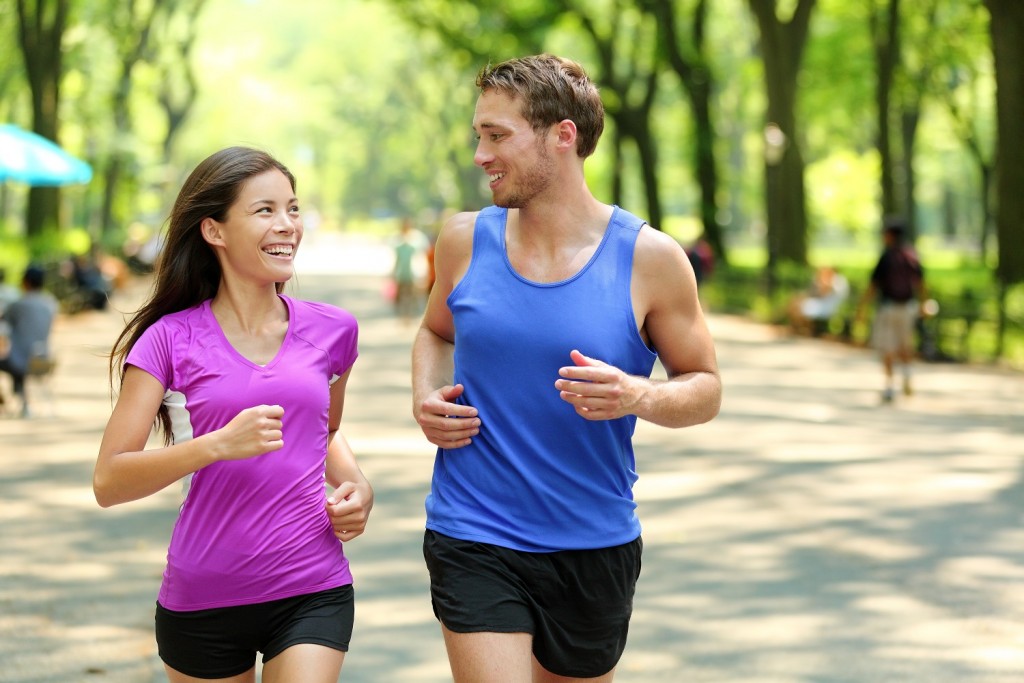 Young-couple-people-running-in-park-health-fitness-resized-1024x683.jpg