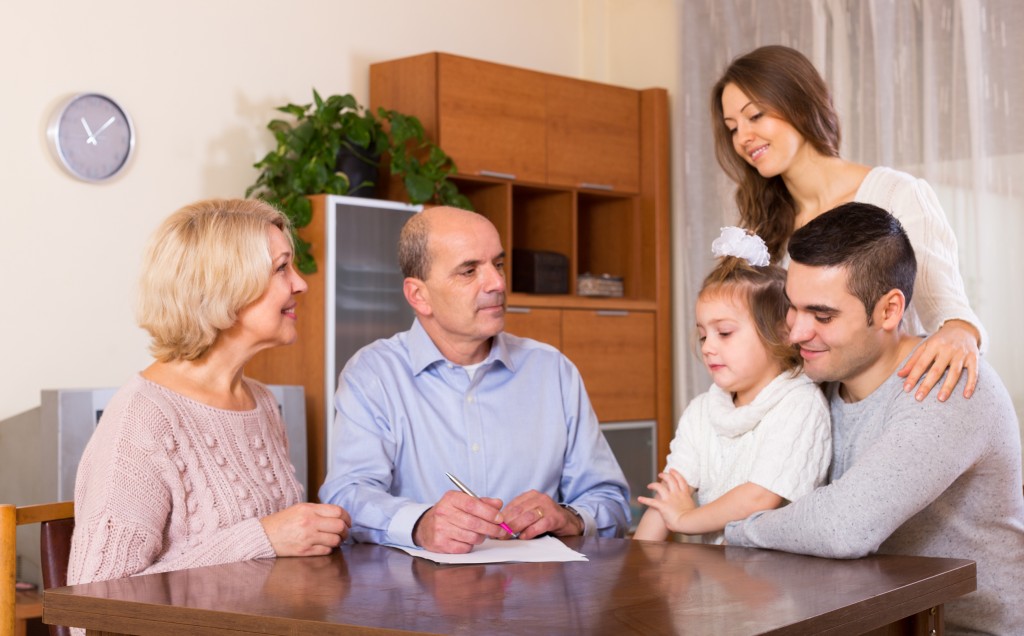 Family-old-with-young-relatives-at-a-table-will-and-testament-inheritance-1024x636.jpg