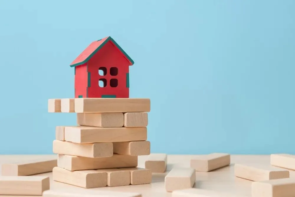 challenge-house-mortgage-jenga-bricks-puzzle-solve-problem.webp