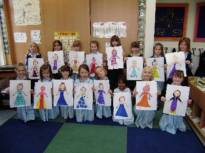 Burgess Hill girls with drawings of gowns for the Queen