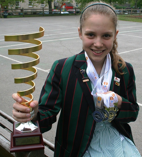 Plymouth College Swimmer Emma de Jager, with medals